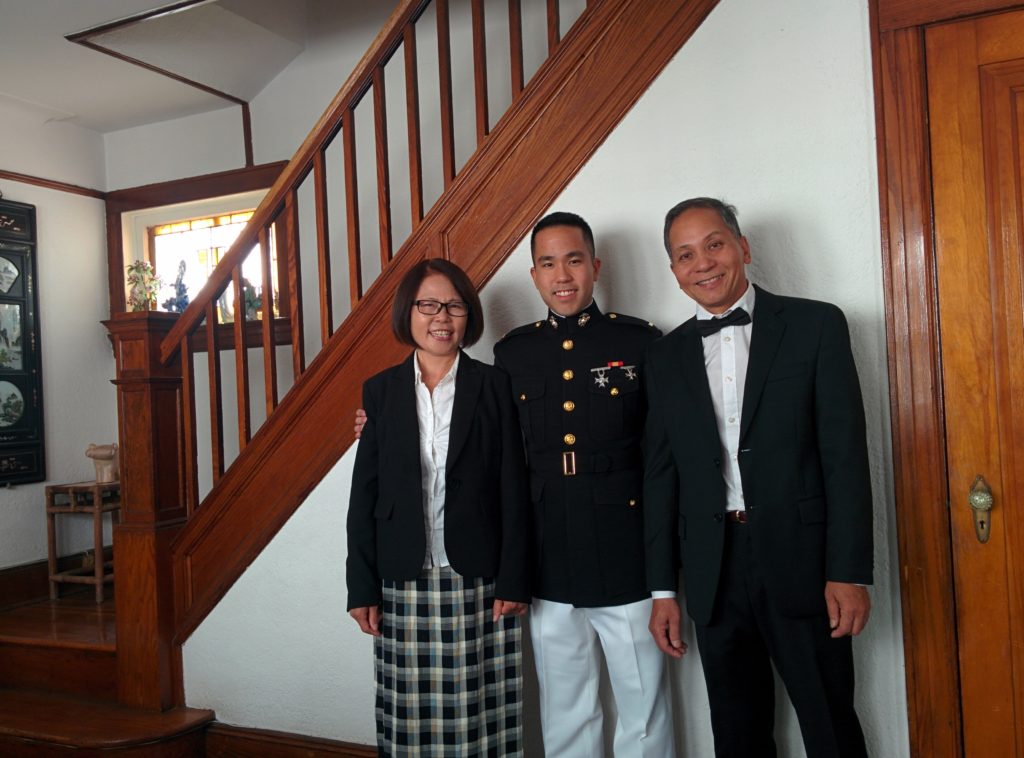 Warren's parents, side by side US Marine