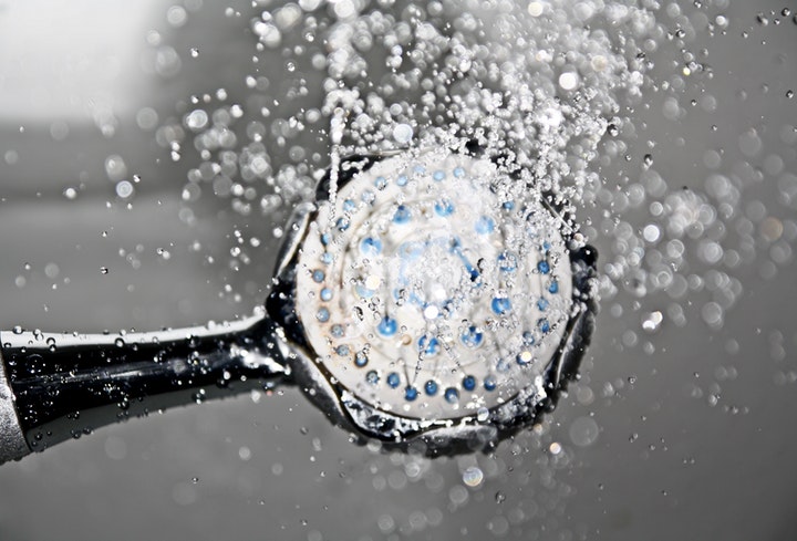 cold shower head raining water
