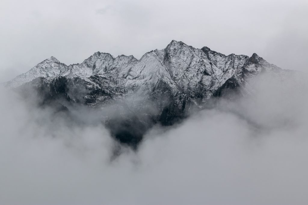 Mountain range with white clouds