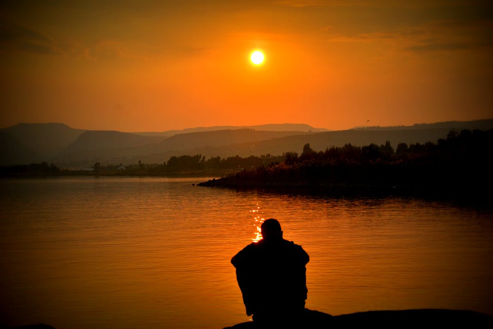 sunset with a man in the background